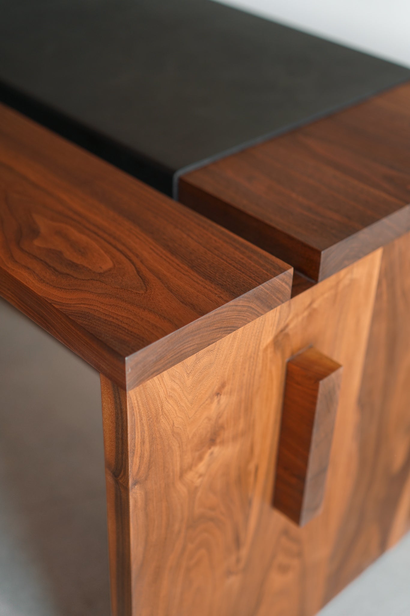 Carter desk- close up on walnut wood and leather detail