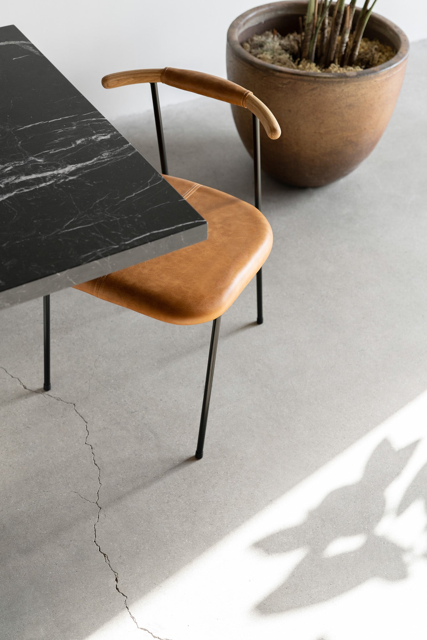 Cleo dining chair top shot styled next to table