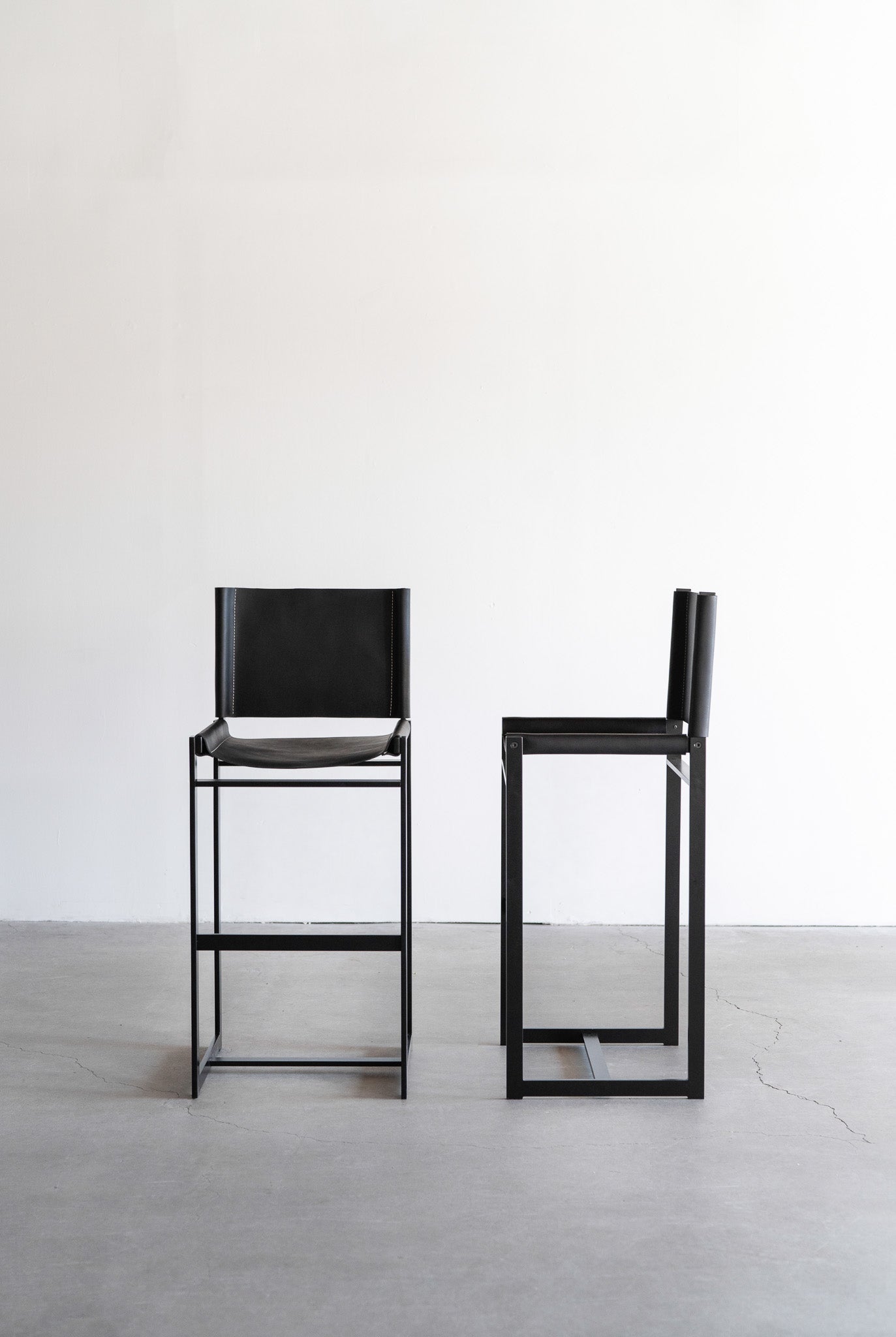 Latigo bar stools - black leather