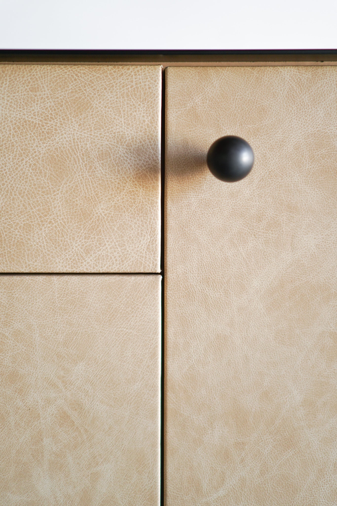 Norah buffet - close up on leather doors