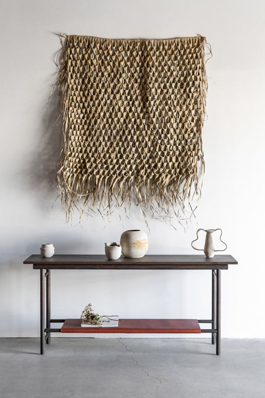 Reyes console- solid walnut, structural leather shelf