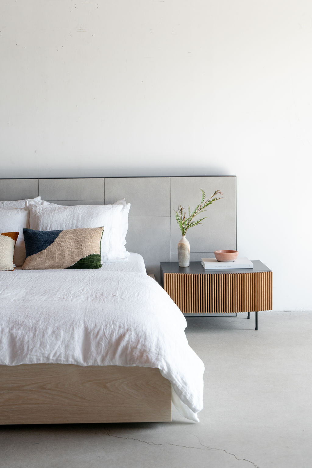 brooks nightstand - shot next to a bed