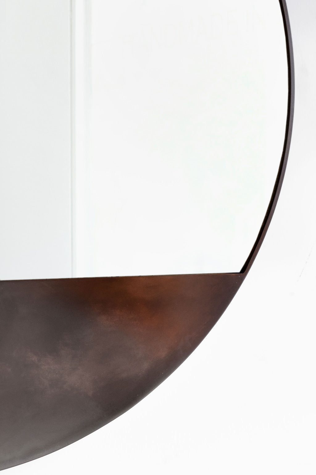 Zoomed in shot of Bronson Mirror - Patina metal frame