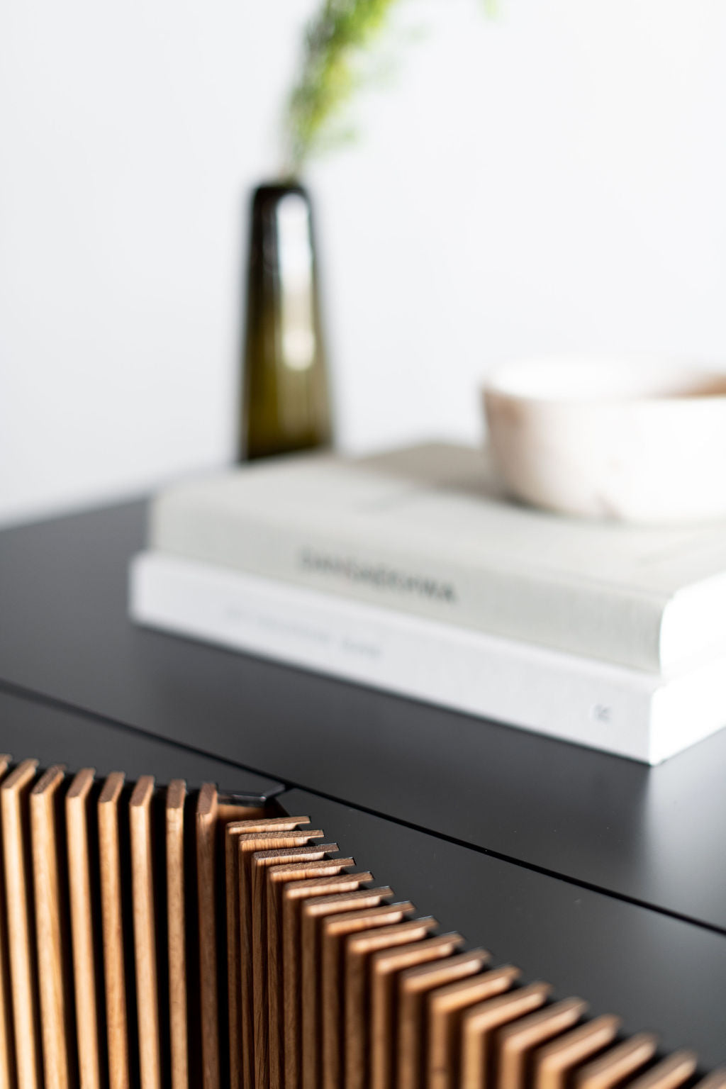 Close up on brooks credenza steel casing and wooden doors doors