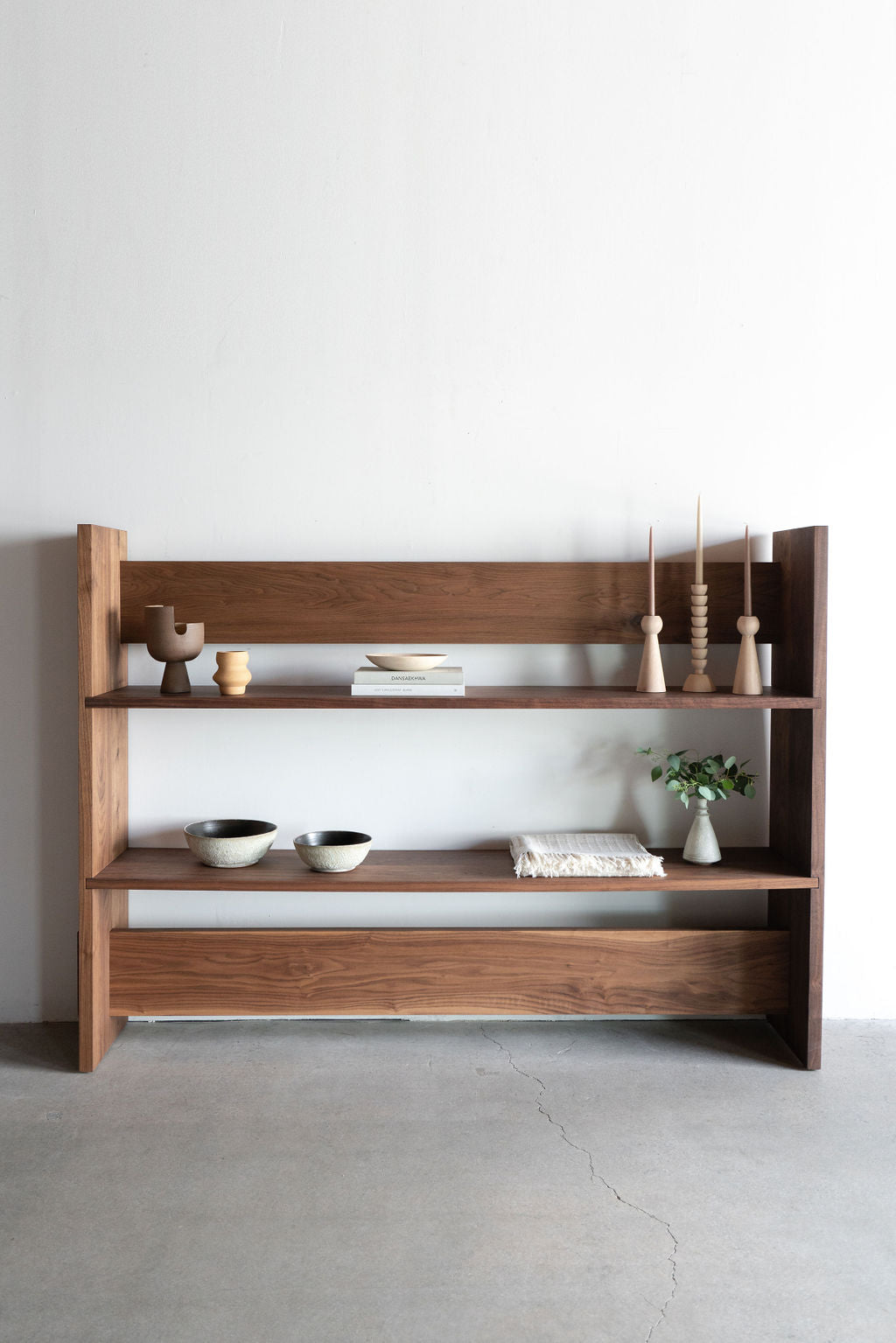 Carter bookcase- full shot -walnut bookcase styled