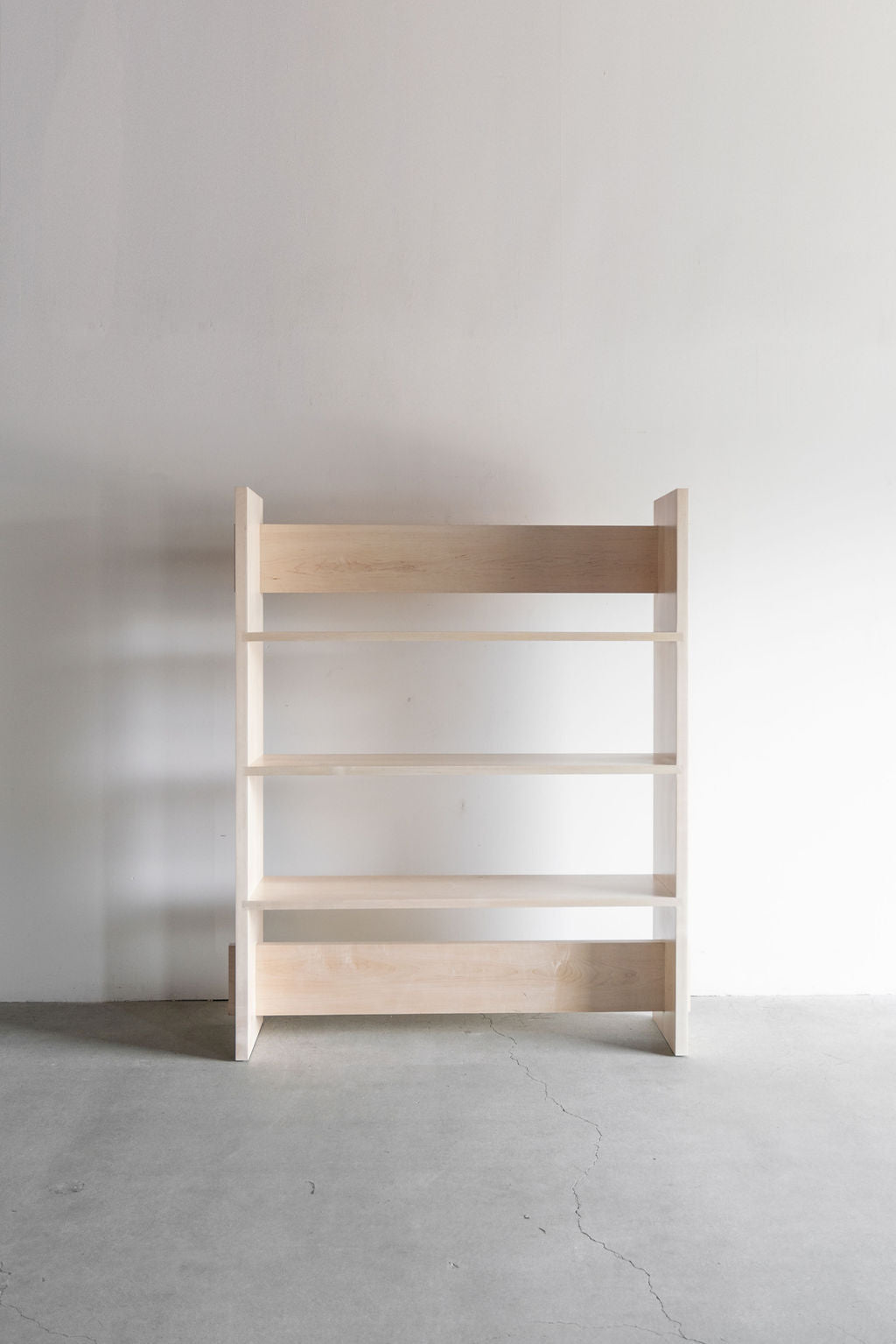 Carter Bookcase- Full shot of all wood bookcase