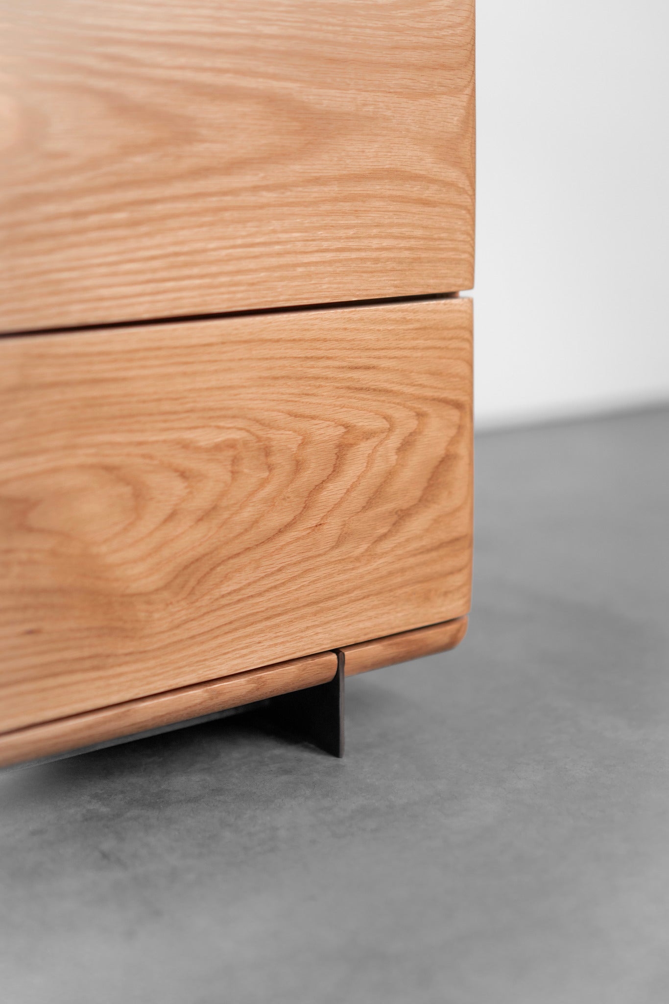 Carter dresser- bottom right close up on steel leg and oak detail