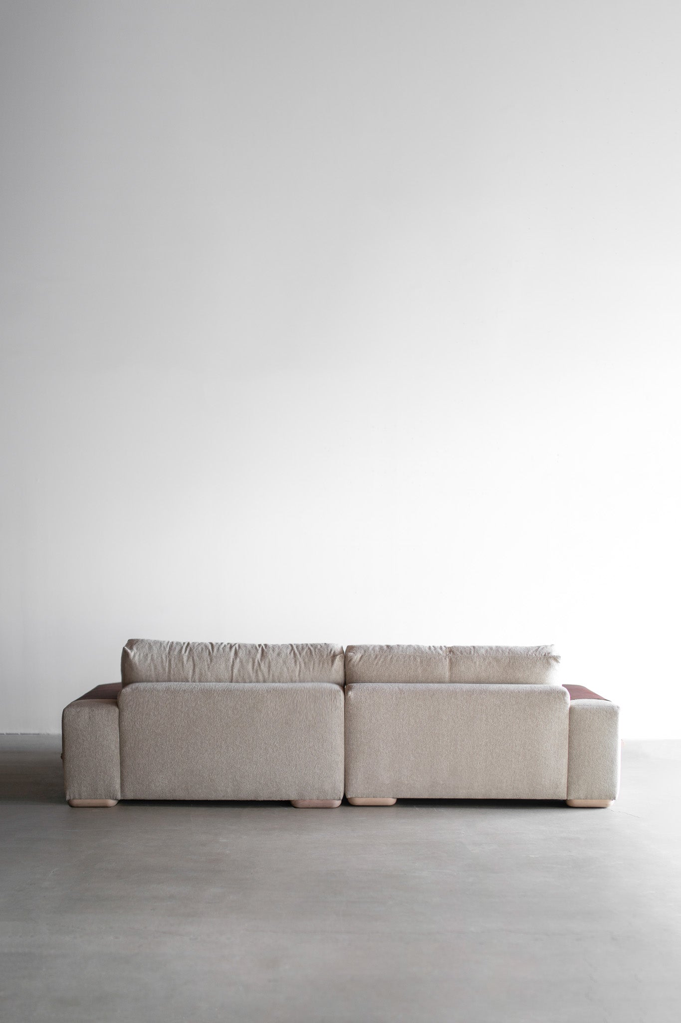 Back shot of Sofa with wood legs