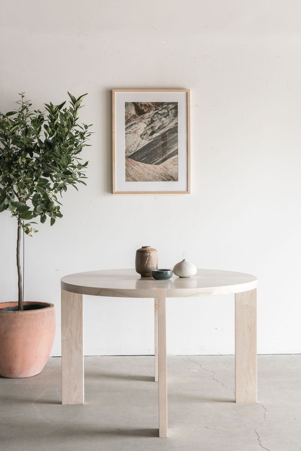 Eve dining table bleached maple - Full shot, styled
