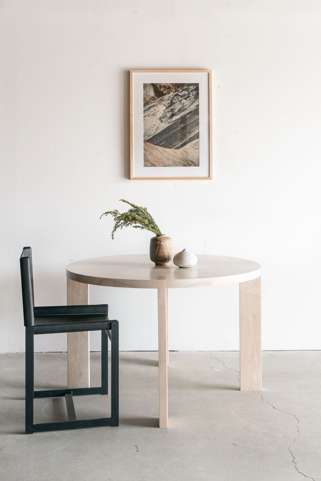 eve dining table bleached maple - full shot, styled with chair