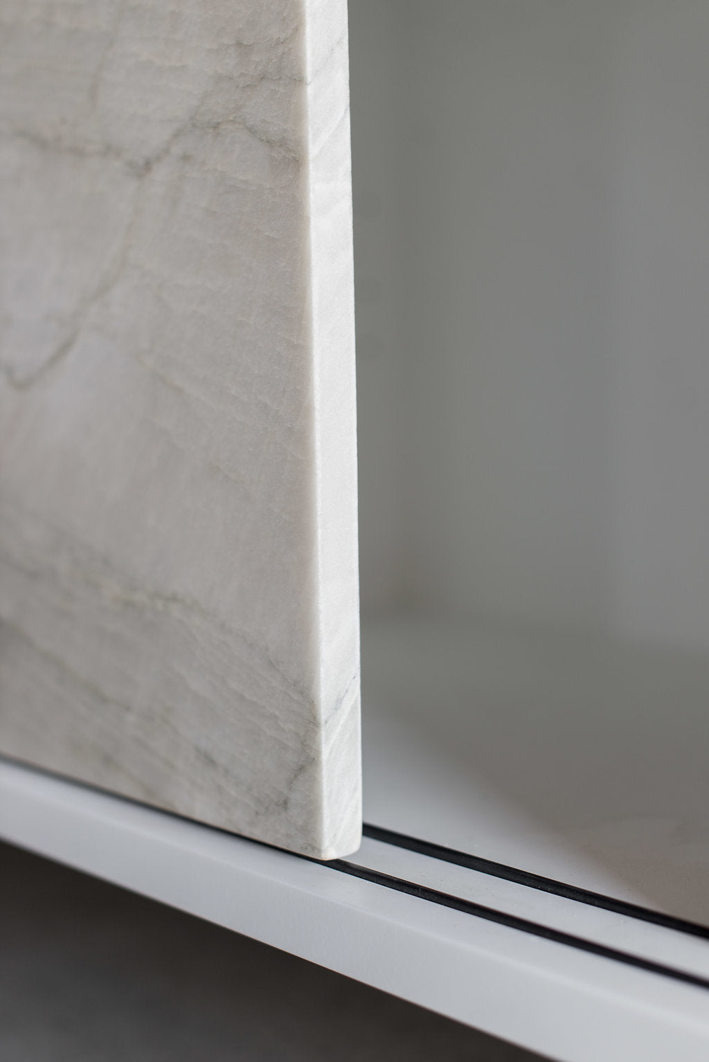 Granada credenza - close up on marble doors