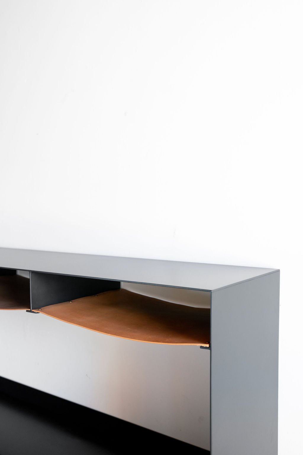 Latigo console - steel casing with leather shelves