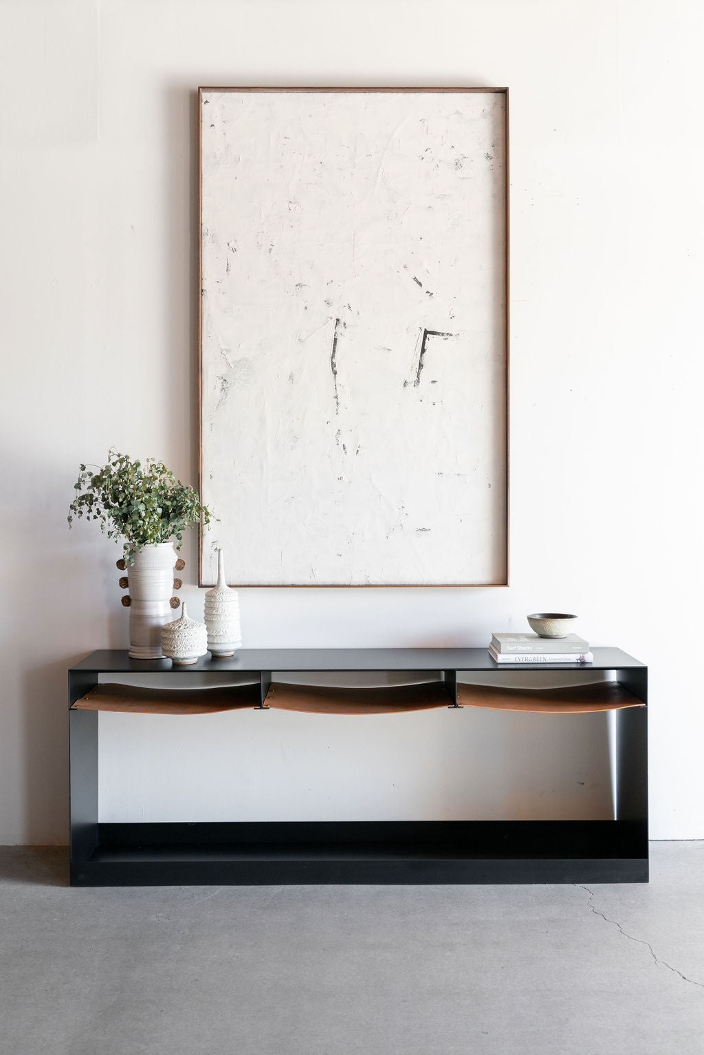 Latigo console - steel casing with leather shelves