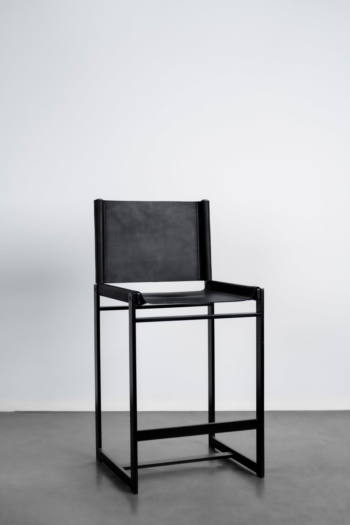 Latigo counter stool - steel legs with leather seat and back