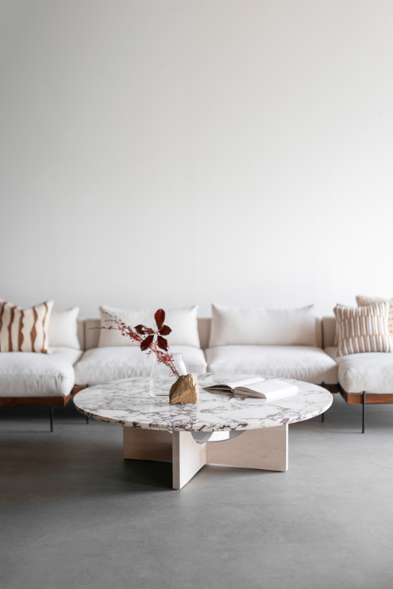 Mira coffee table styled - marble top, wood legs