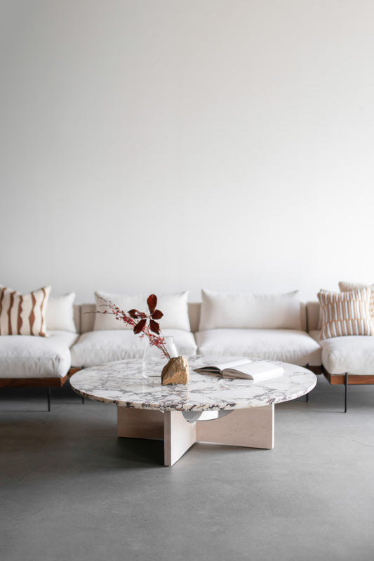 Mira coffee table styled - marble top, wood legs