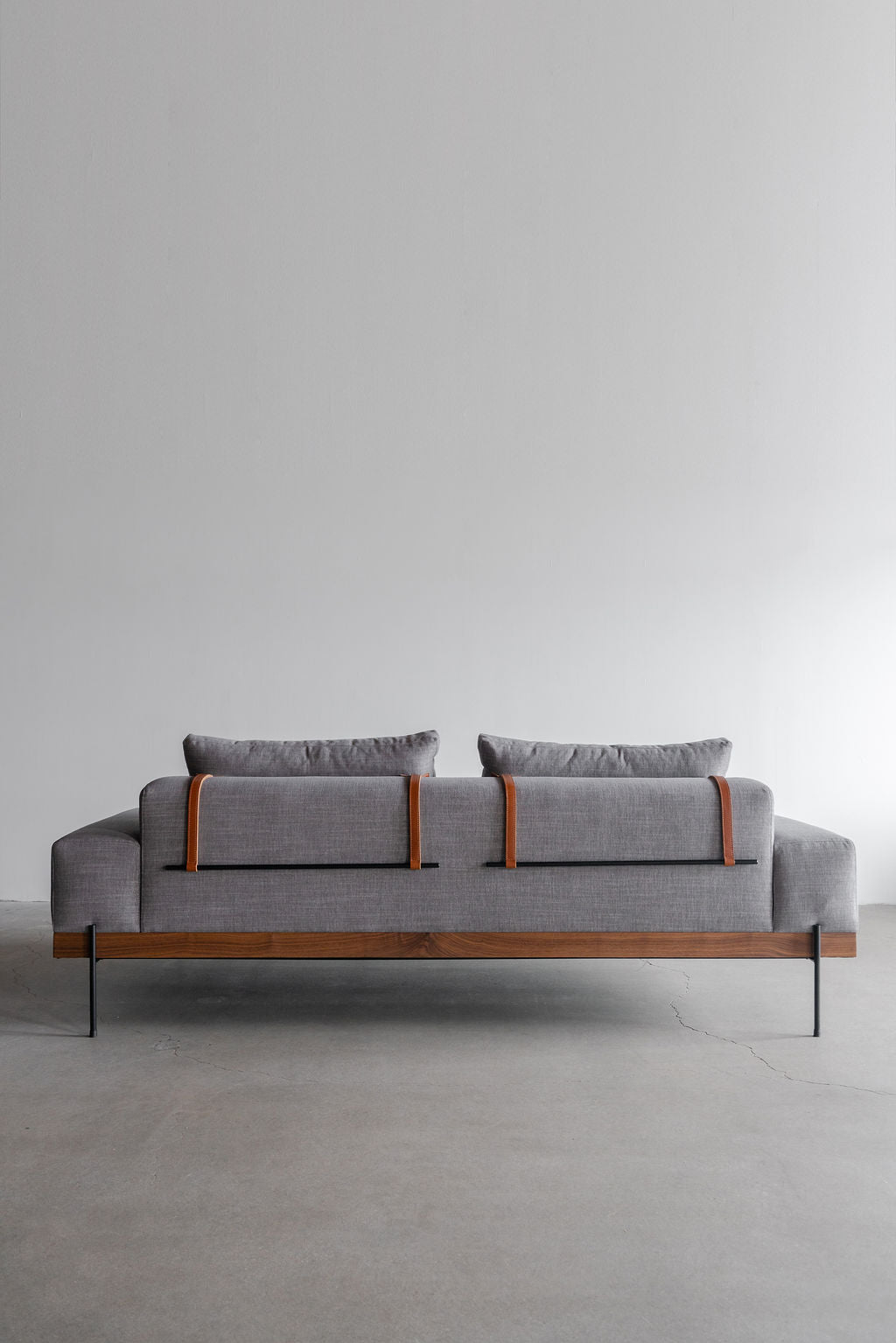 Rivera sofa- wood frame, steel legs and upholstered cushions