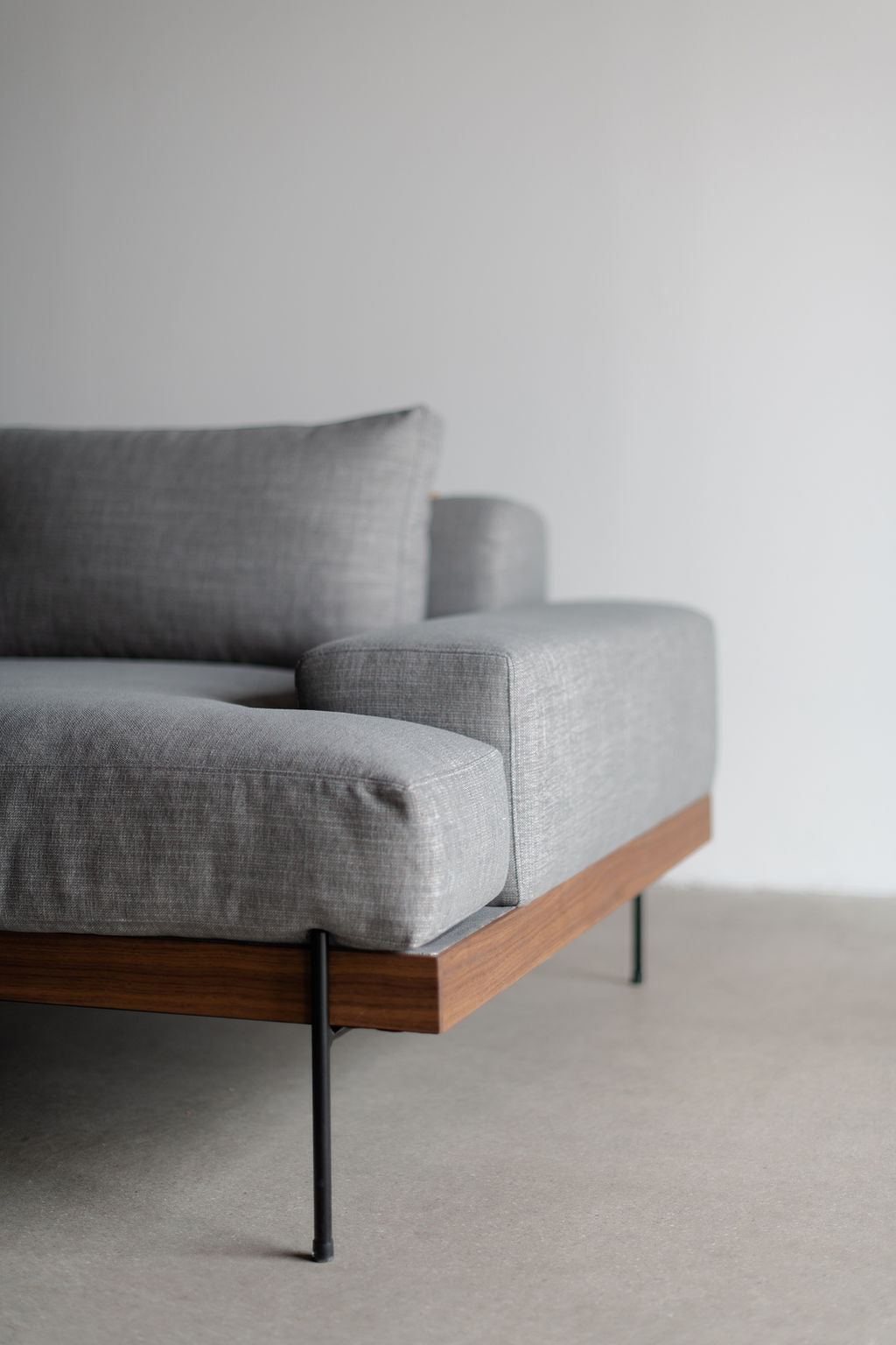 Rivera sofa- wood frame, steel legs and upholstered cushions