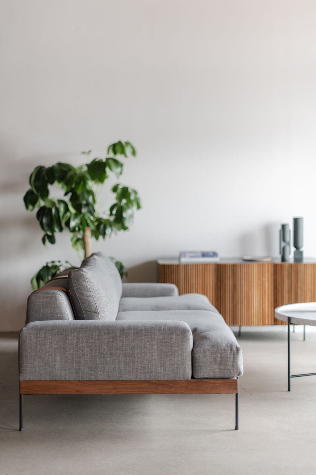 Rivera sofa- wood frame, steel legs and upholstered cushions