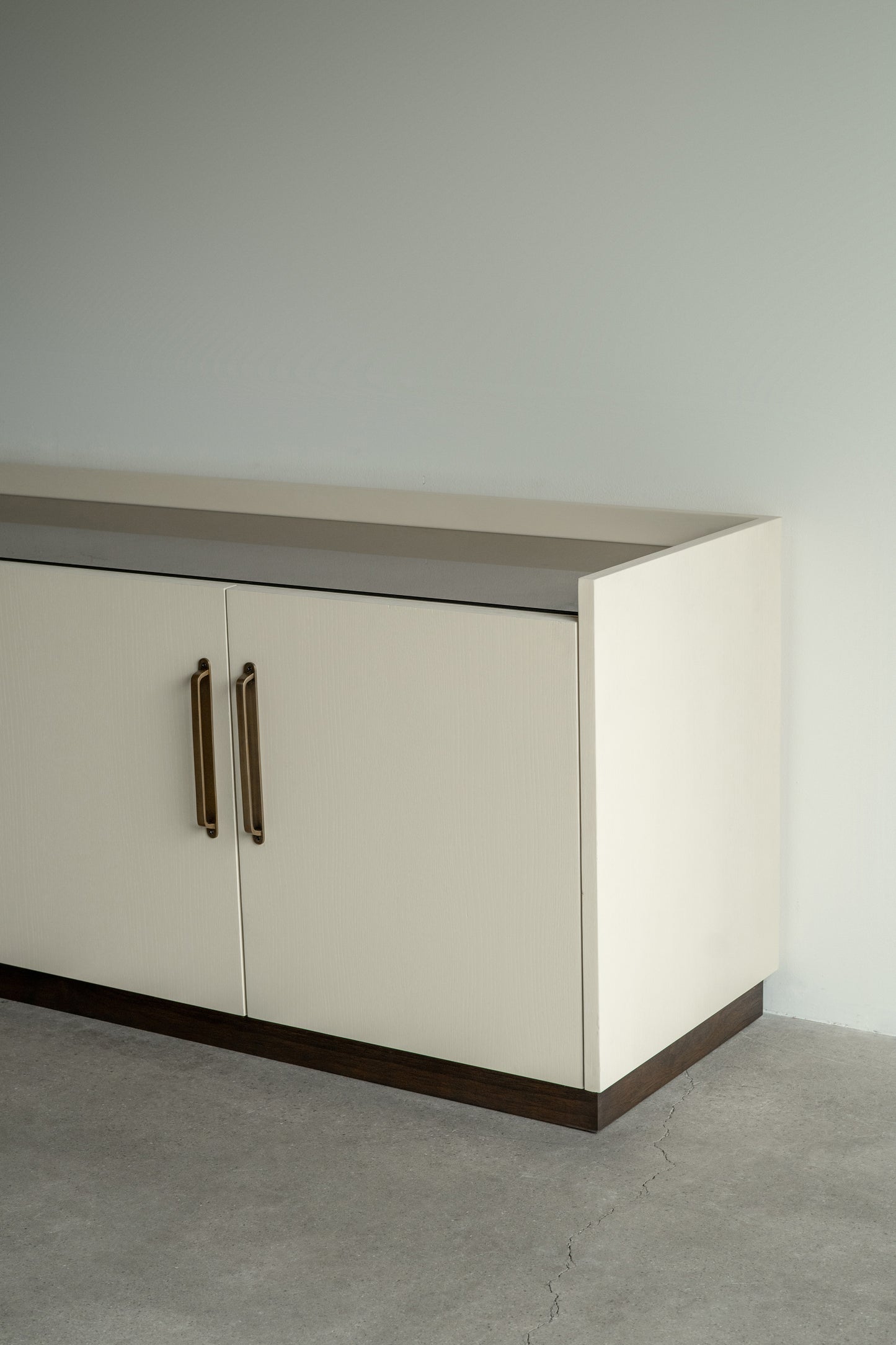 alt_text::Marella Credenza - shot of left side||color::Mushroom||show_in_gallery::true||position::first