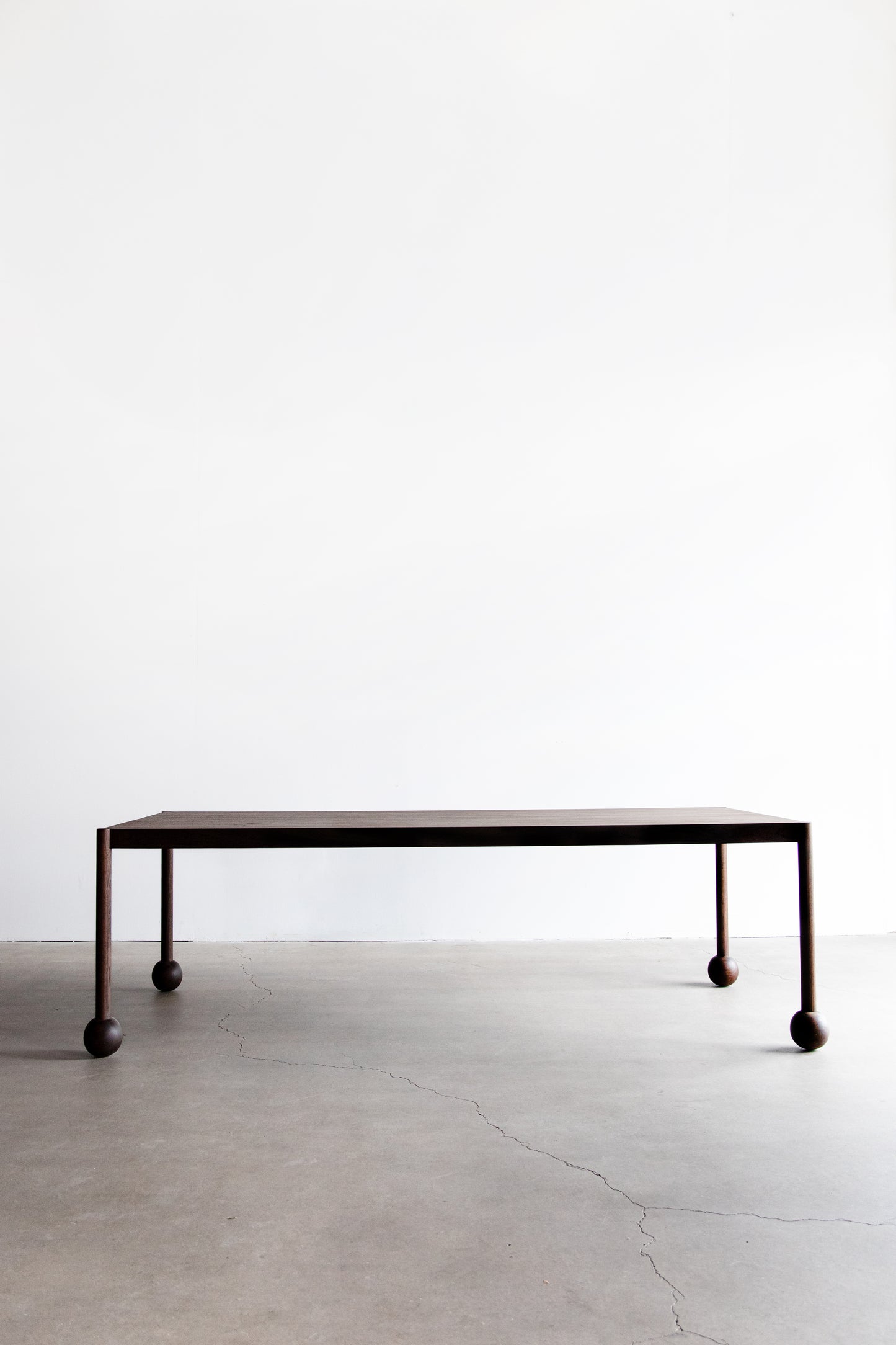 alt_text::Fenn Table - shot of side||color::Walnut||show_in_gallery::true