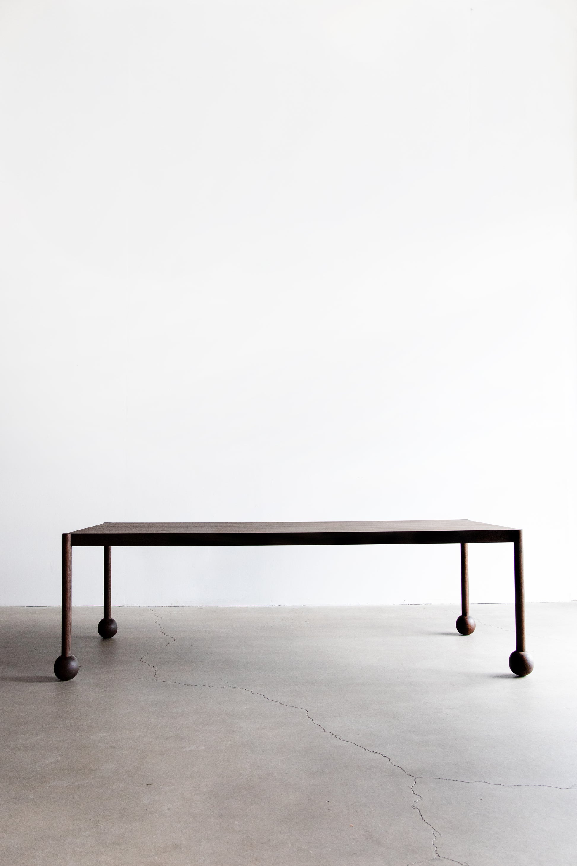 alt_text::Fenn Table - shot of side||color::Walnut||show_in_gallery::true