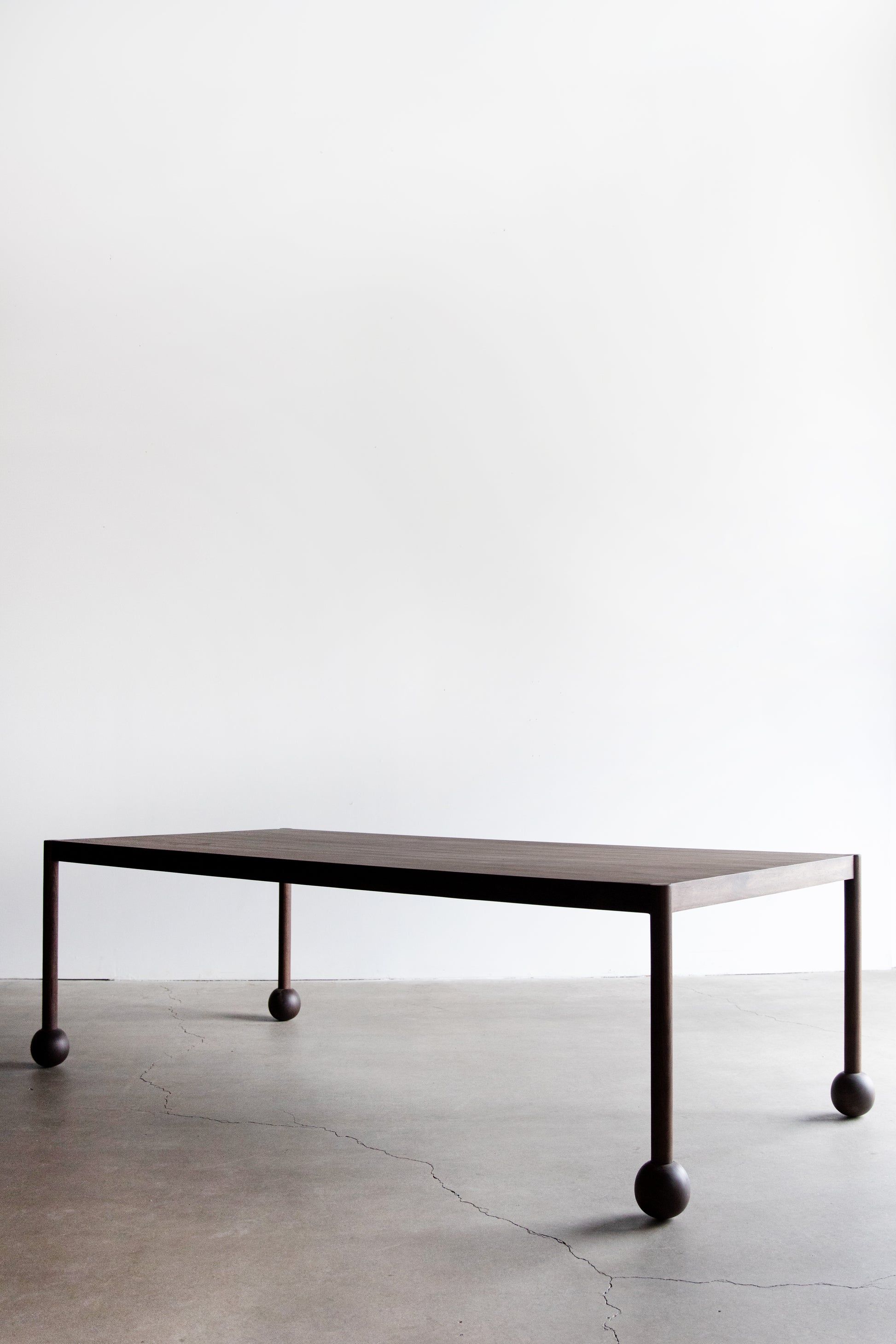alt_text::Fenn Table - shot of side||color::Walnut||show_in_gallery::true
